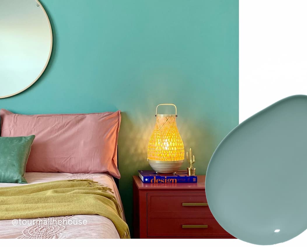 Bedroom featuring blue green paint color Vacay