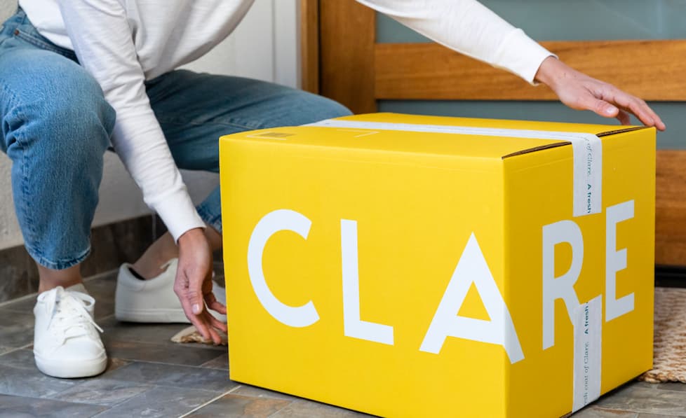 Receiving Clare branded box at front door