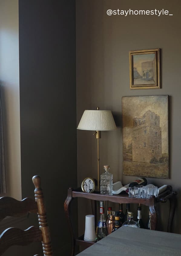 Dining room featuring warm brown paint color Dirty Chai