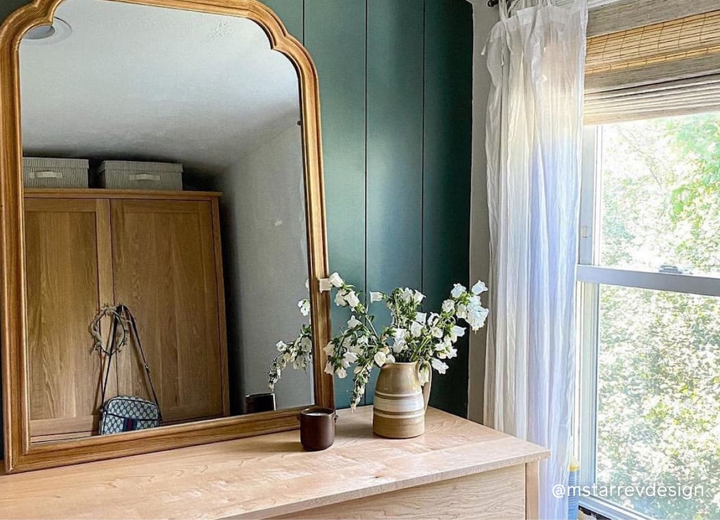 Bedroom featuring moody green paint color Current Mood Bedroom featuring moody green paint color Current Mood