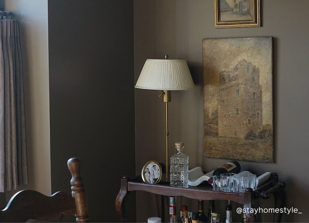 Dining room featuring warm brown paint color Dirty Chai Dining room featuring warm brown paint color Dirty Chai