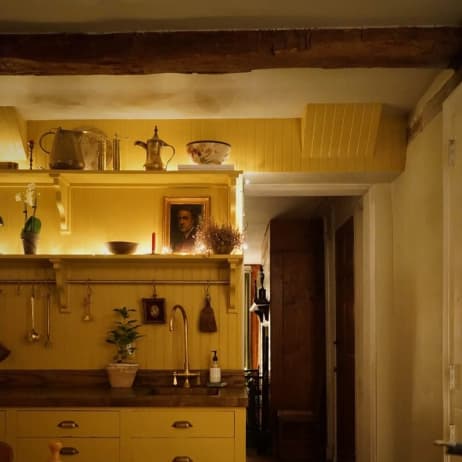 Interior vignette featuring paint color Good as Gold