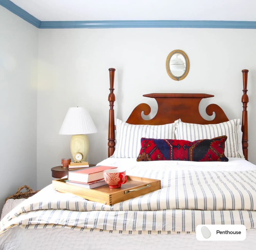 Bedroom featuring grayish beige paint color Penthouse by Clare