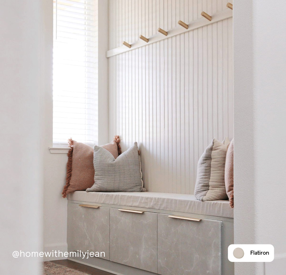 Entryway featuring warm taupe paint color Flatiron