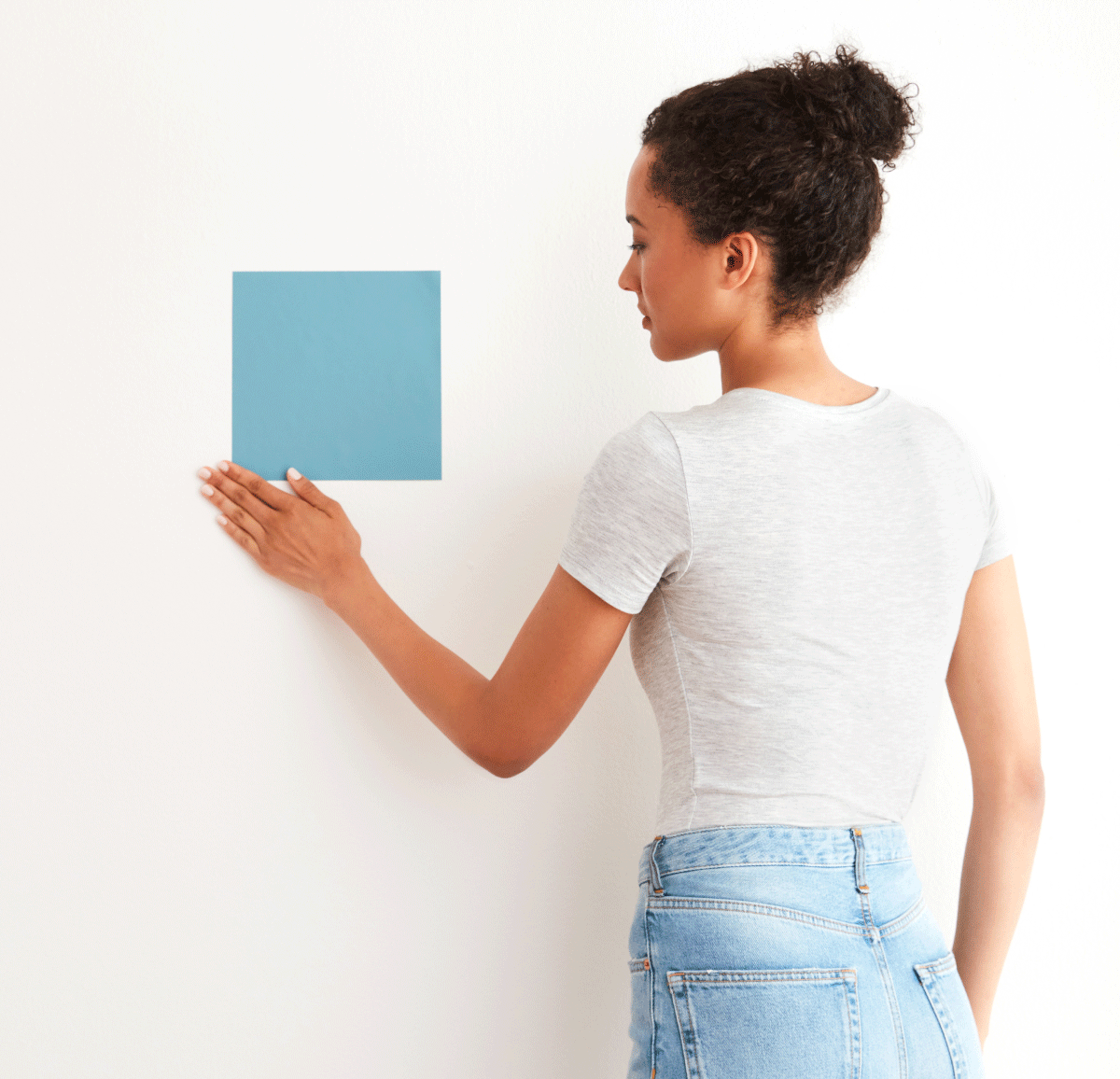 Applying Peel-and-Stick Swatch to the wall