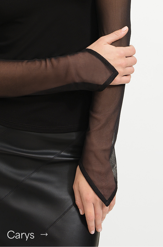 Close-up of the Carys Top’s sheer sleeves paired with the Jovie Skirt.