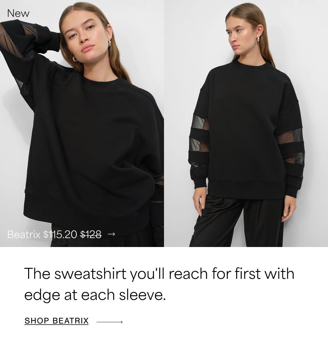 Two views of Bianca wearing a black Beatrix Sweatshirt with sheer mesh panel sleeves against a white background, with text reading “Mesh sleeves, in case anyone assumed gym.” and “New,” priced at $115.20, originally $128. SHOP BEATRIX →