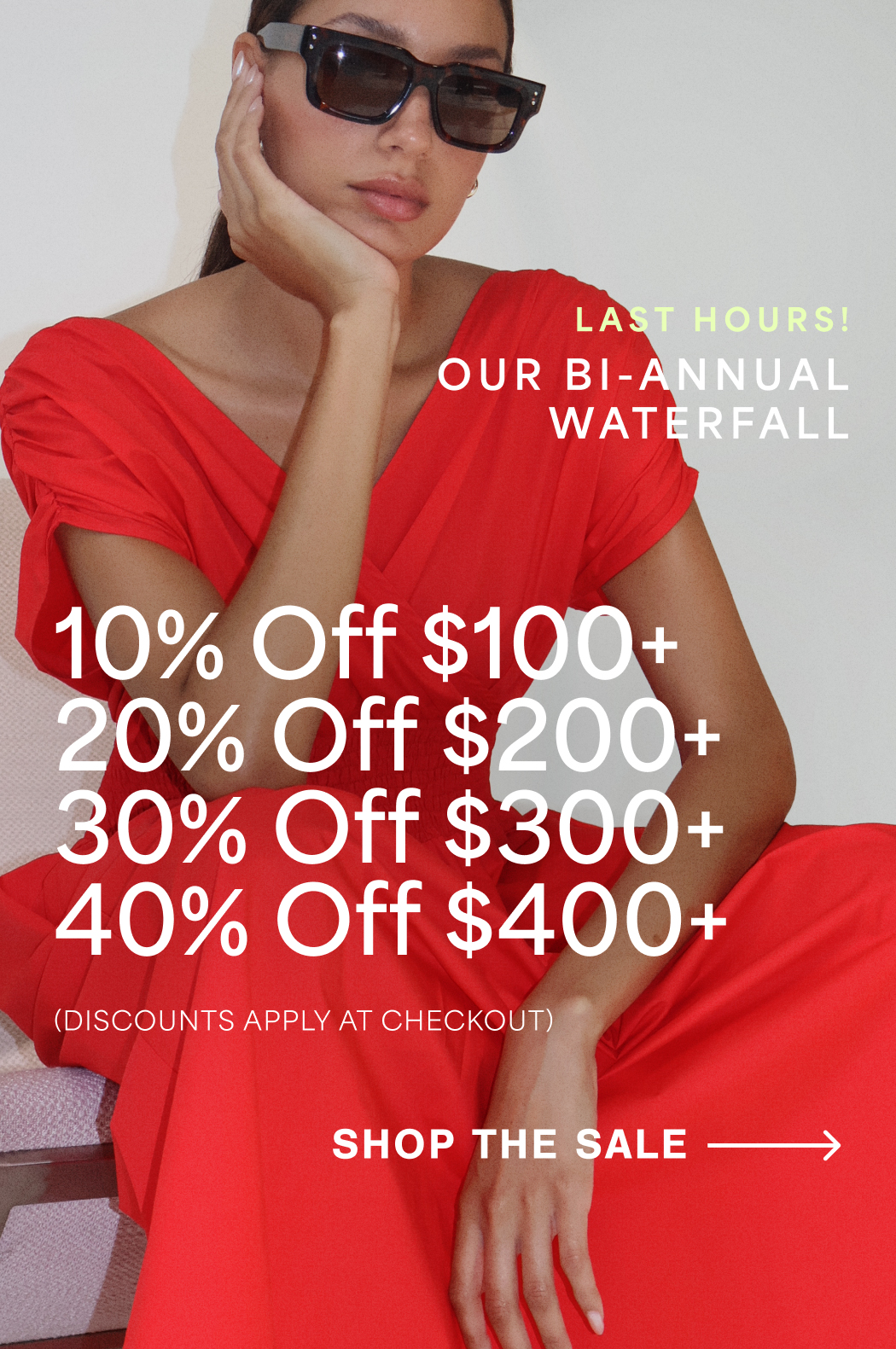 Carmel in The Signe Dress with overlay text showing last hours of a bi-annual sale offering up to 40% off, based on order value.