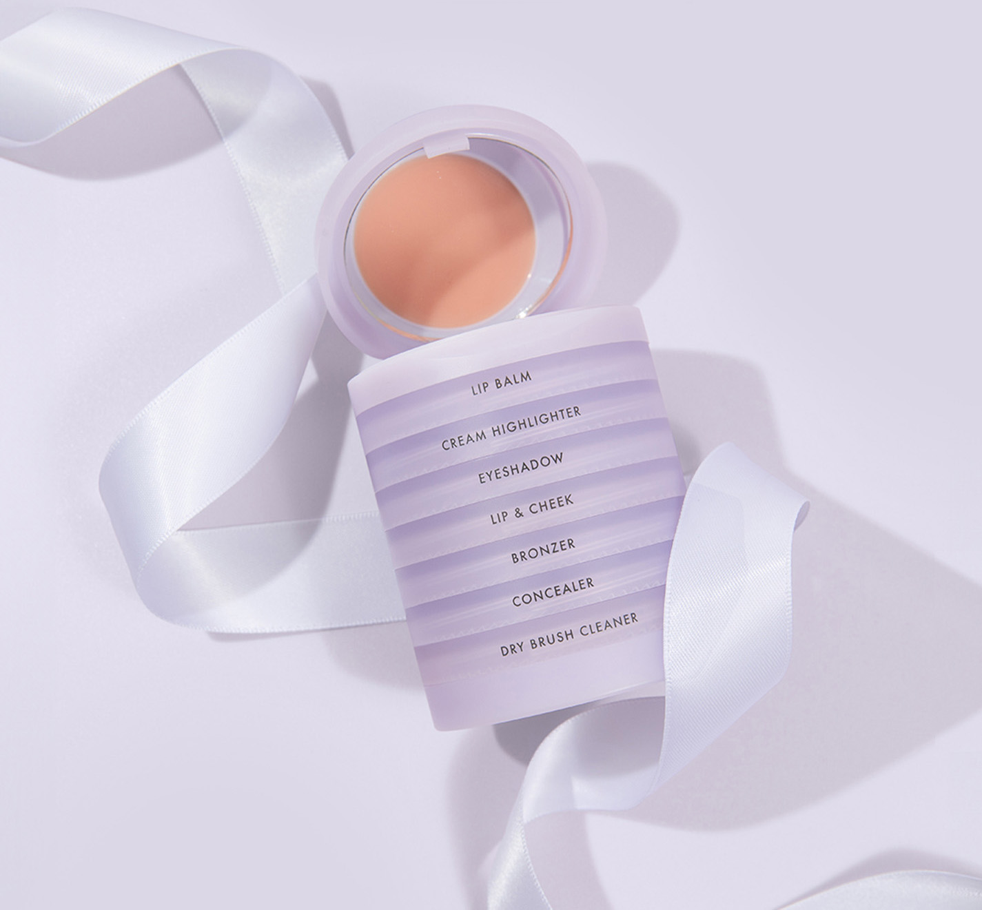 take a peek inside the set: elderberry escapade lip & cheek, translucent shine control powder, staycation eyeshadow duo, and the cosmetic travel bag.