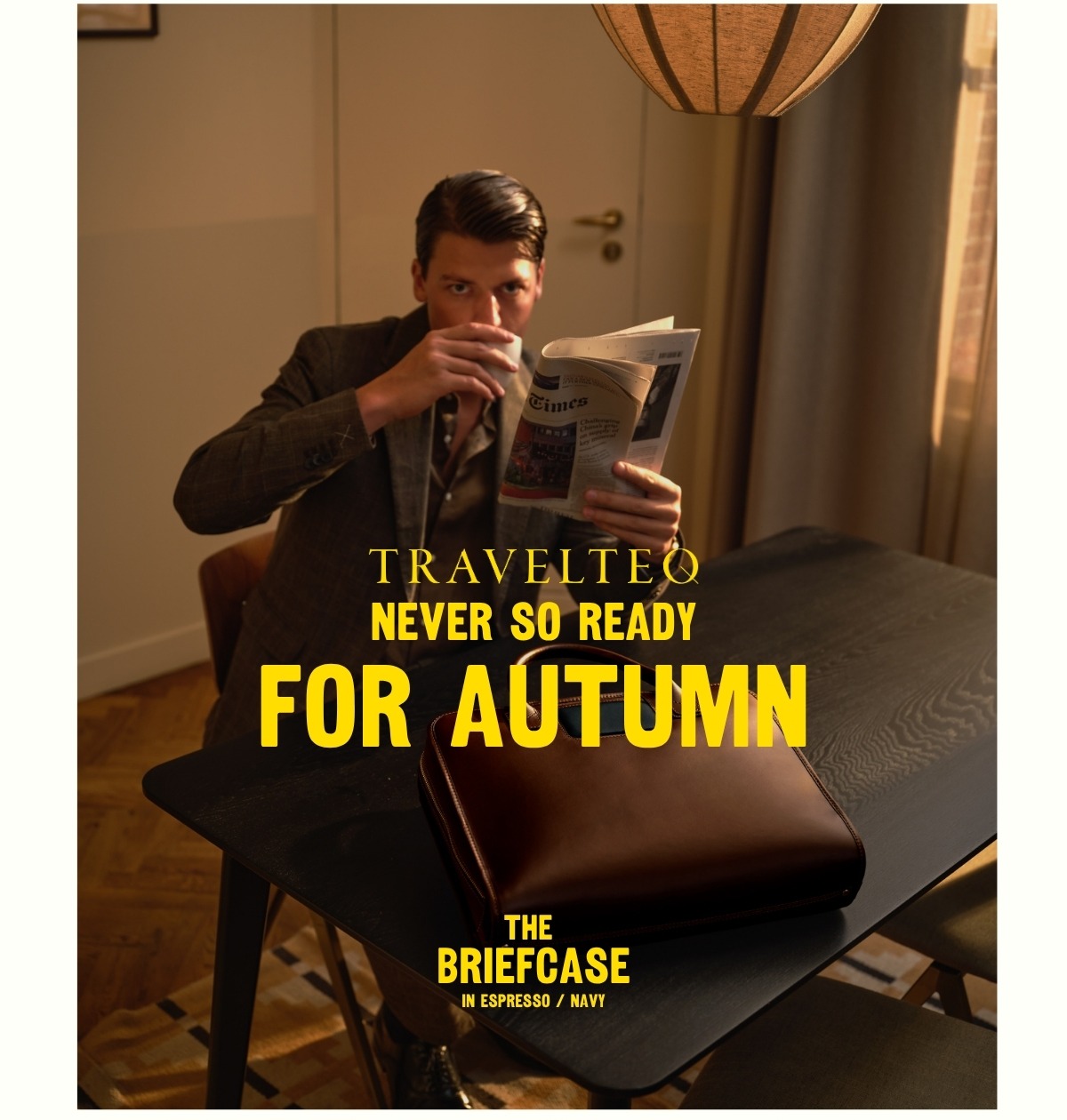 man drinking coffee and reading newspaper