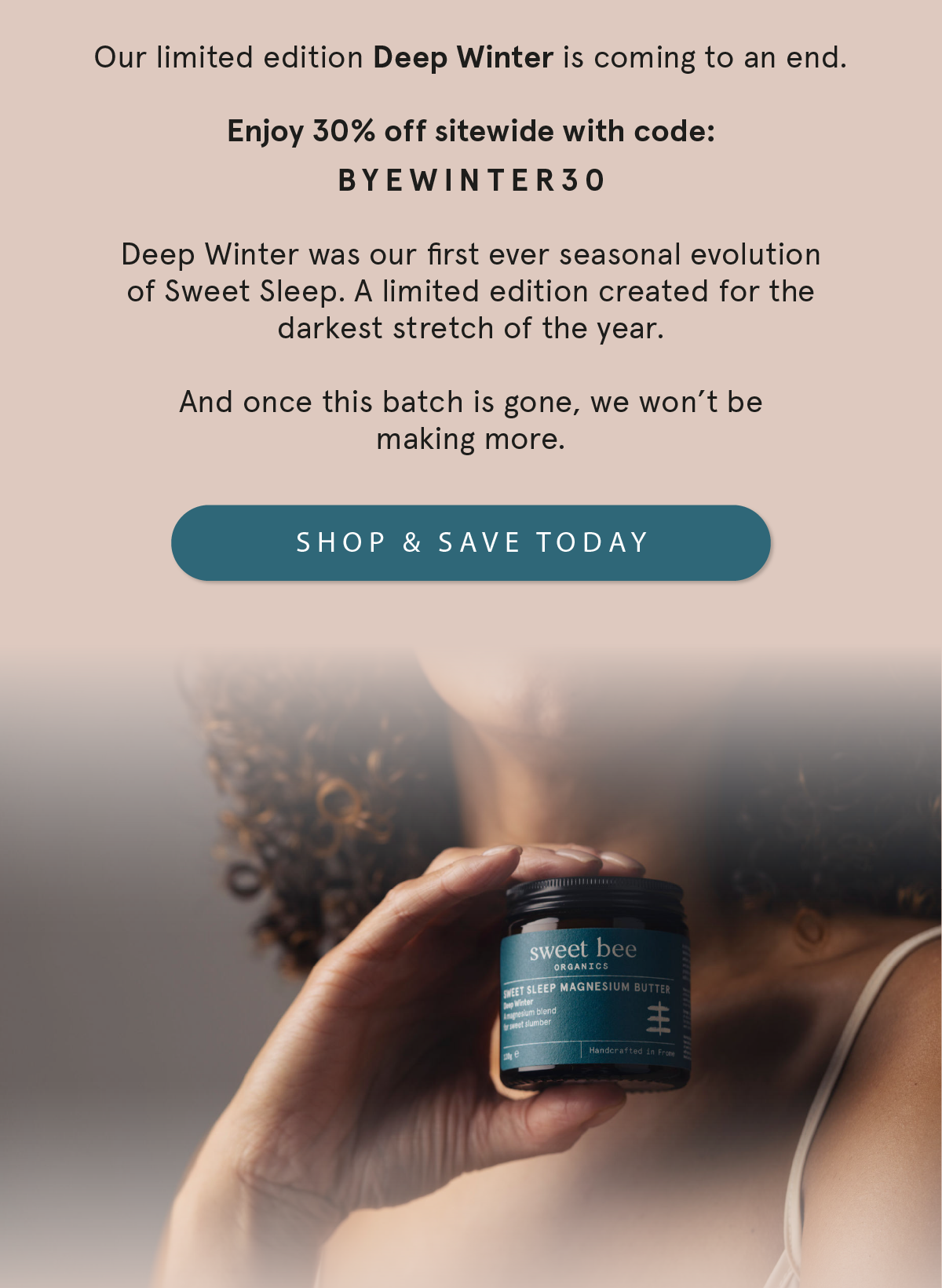 an image of a woman holding a jar of skin care products