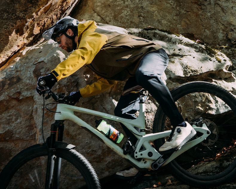 Three flannel jackets are in a row.