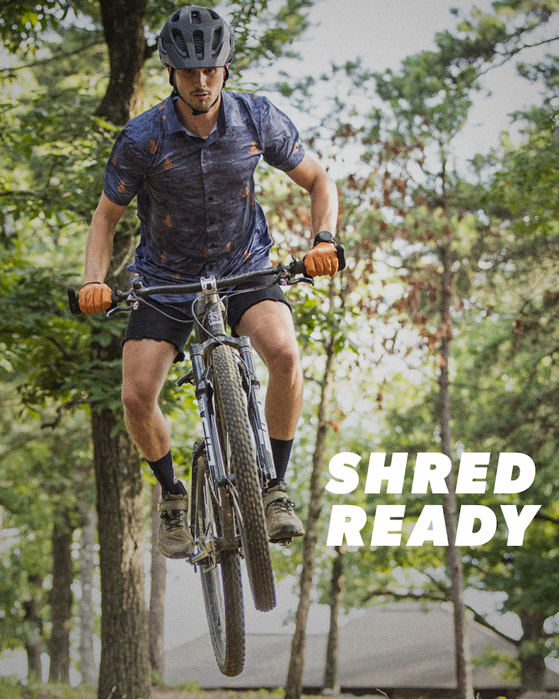 image showing a person on a mountain bike featuring the text "Shred Ready"