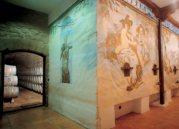 The  cellar of Bodegas Palacio producer of Cosme Palacio Rioja Vendimia Seleccionada showing wall frescos.