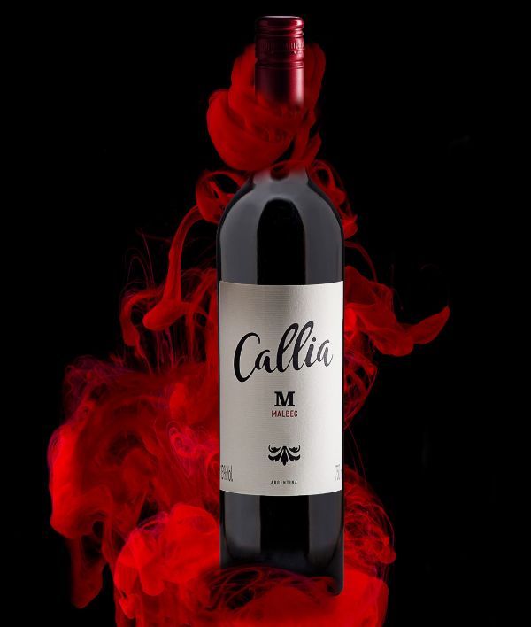 Bottle of Callia Malbec 2021 by Bodegas Salentein amidst a red rising mist.