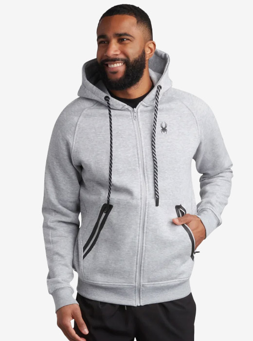 Man wearing fleece Spyder logo hoodie