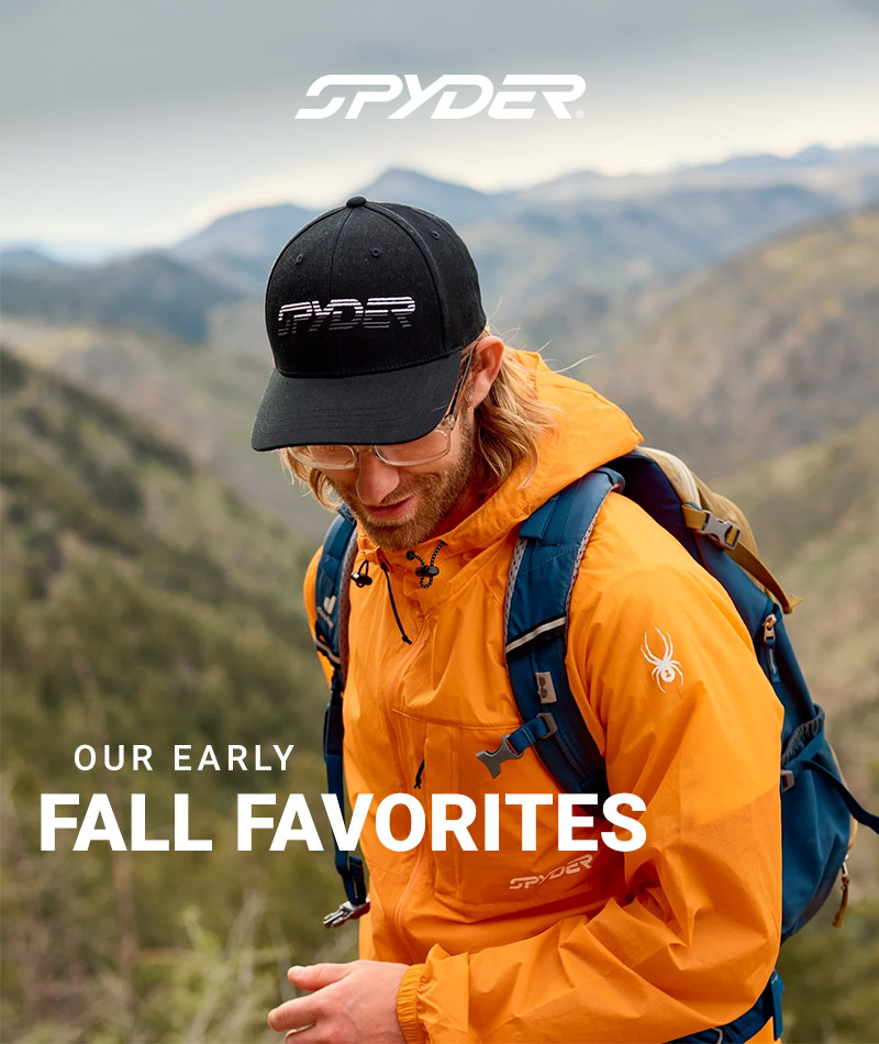Hiker wearing a tangerine Spyder windbreaker