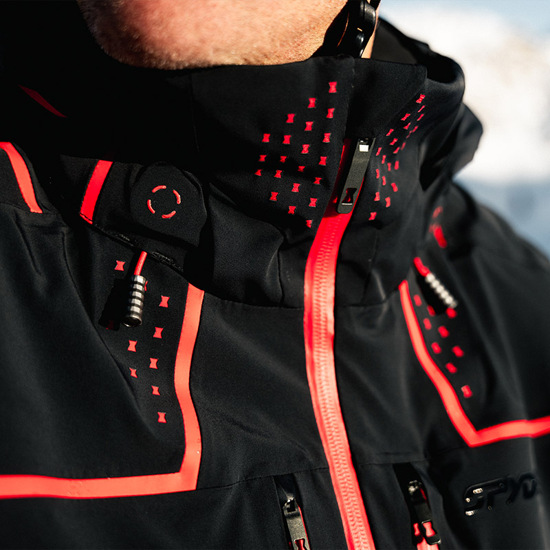 Detail of jacket neck vents, waterpoof zipper and drawcords.