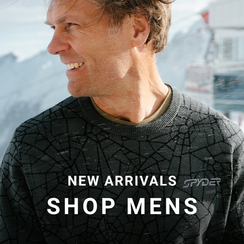 Man looking to the left wearing a Spyder sweater with web print. Message: New Arrivals Shop Mens