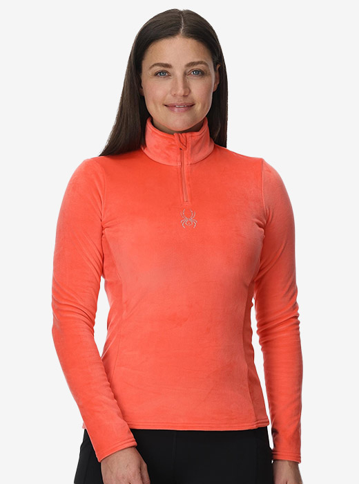 Model in studio wearing a cozy half zip sweater