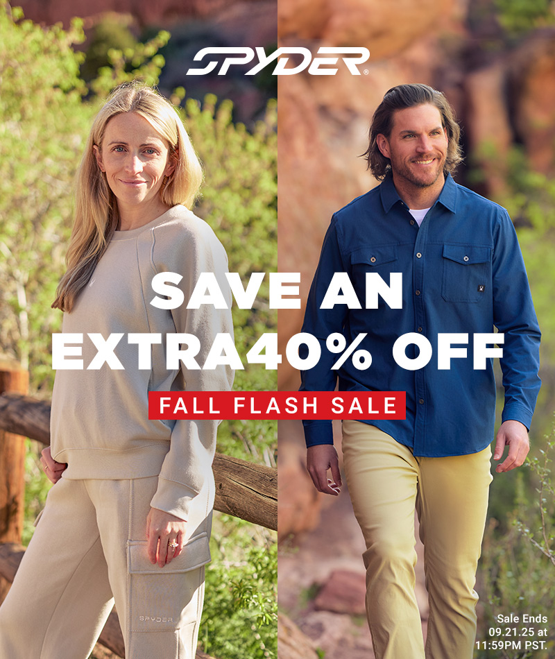 Woman wearing a Spyder fleece outfit and a man wearing a blue Spyder button-up. Save an Extra 40% Off - Fall Flash Sale