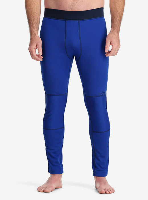 Man waist down photo in studio wearing a blue Spyder baselayer
