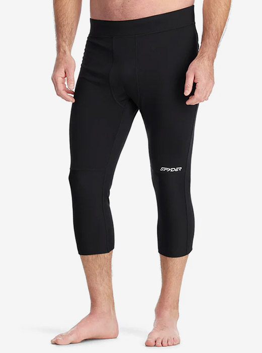 Man waist down photo in studio wearing a black Spyder baselayer