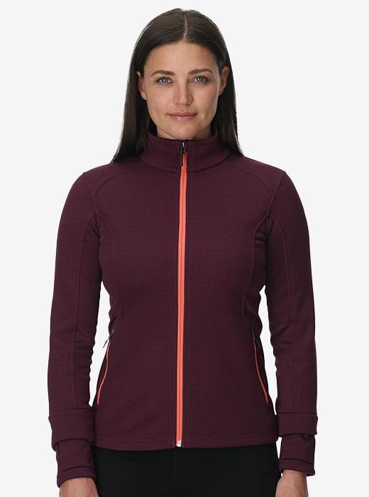 Women in a studio wearing Bandita Jacket in plum colorway