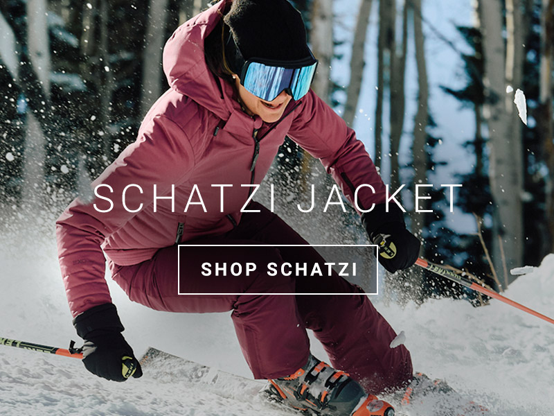 Female skier carving by wearing the Schatzi Jacket - Shop Schatzi