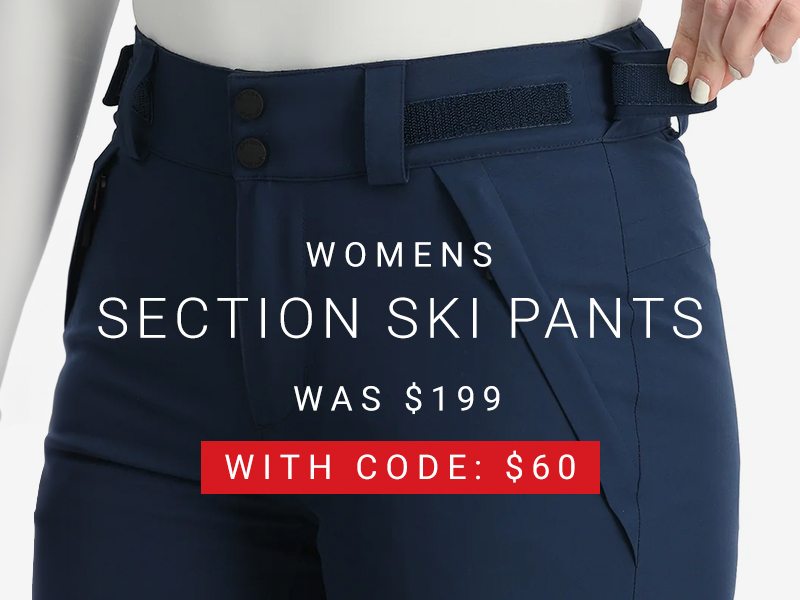 Close up of navy ski pants. Message: Women's Section Ski Pants. Was $199. With Code: $60