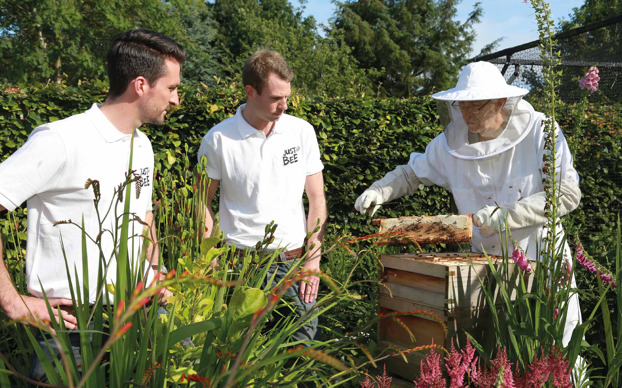 Joe and Andy with Joes Dad looking at his beehive