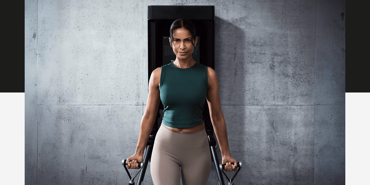 a woman working out with Tonal 2