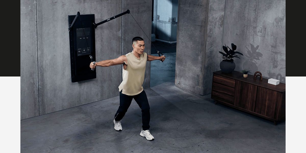 A man working out with Tonal 2