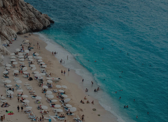 an image of a beach with a yellow sign that says 25 % off spring break styles