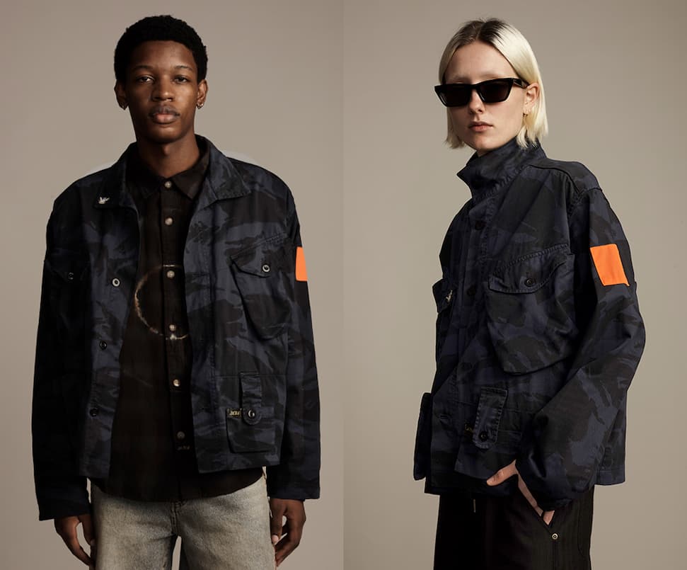 an image of a man and a woman wearing jackets and sunglasses