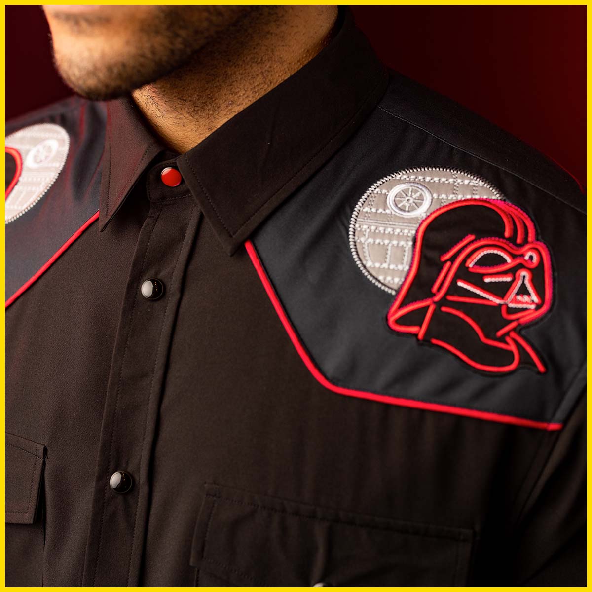 A closeup of "The Ultimate Weapon" roper shirt shows Darth Vader in front of the Death Star.