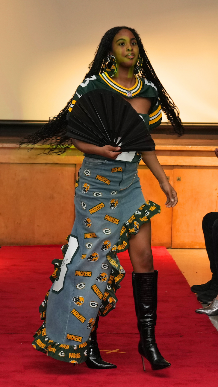 The spin, the high low skirt that used to be pants, the boots, it's all perfect!