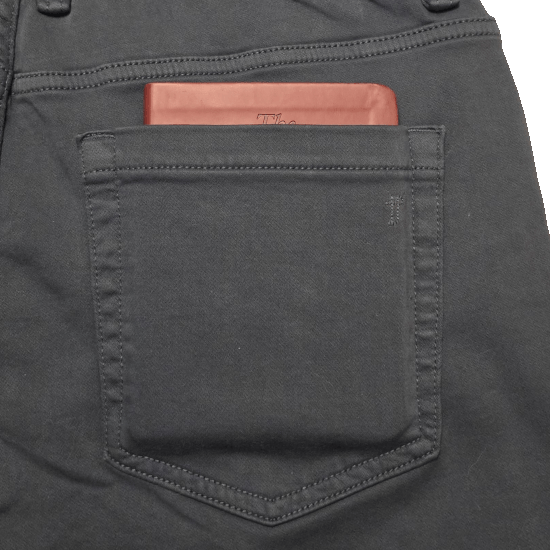 The Hobbit peeking out of the back pocket of a pair of Denkhaki™ Pants in Slate