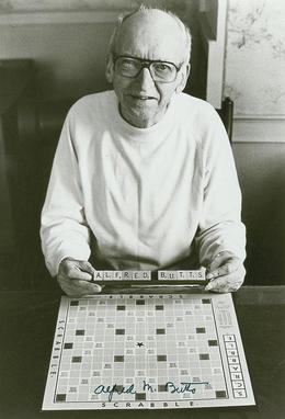Arthur Mosher Butts with his invention: Scrabble