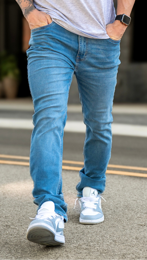 Model is wearing Athletic Jokers and a Grey Tee