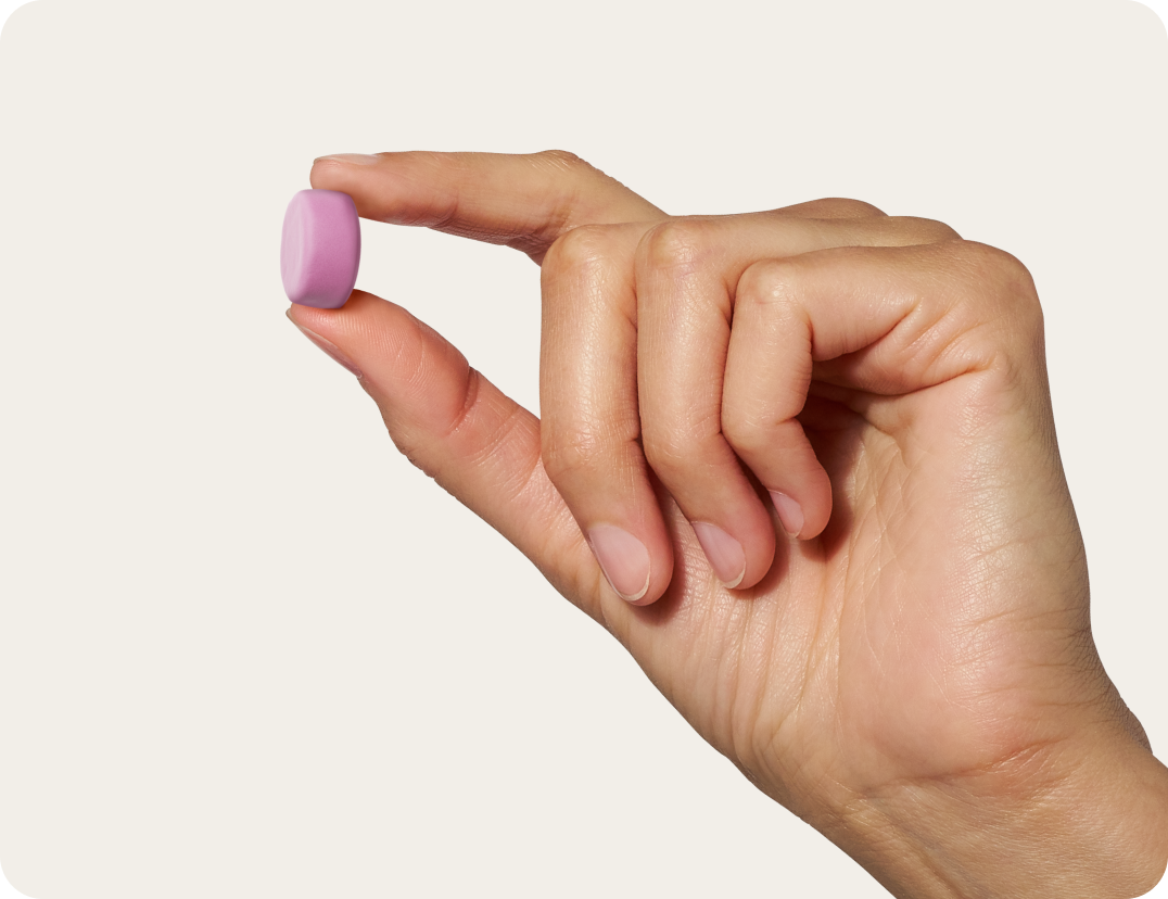 Hand holding a Creatine Monohydrate Gummy