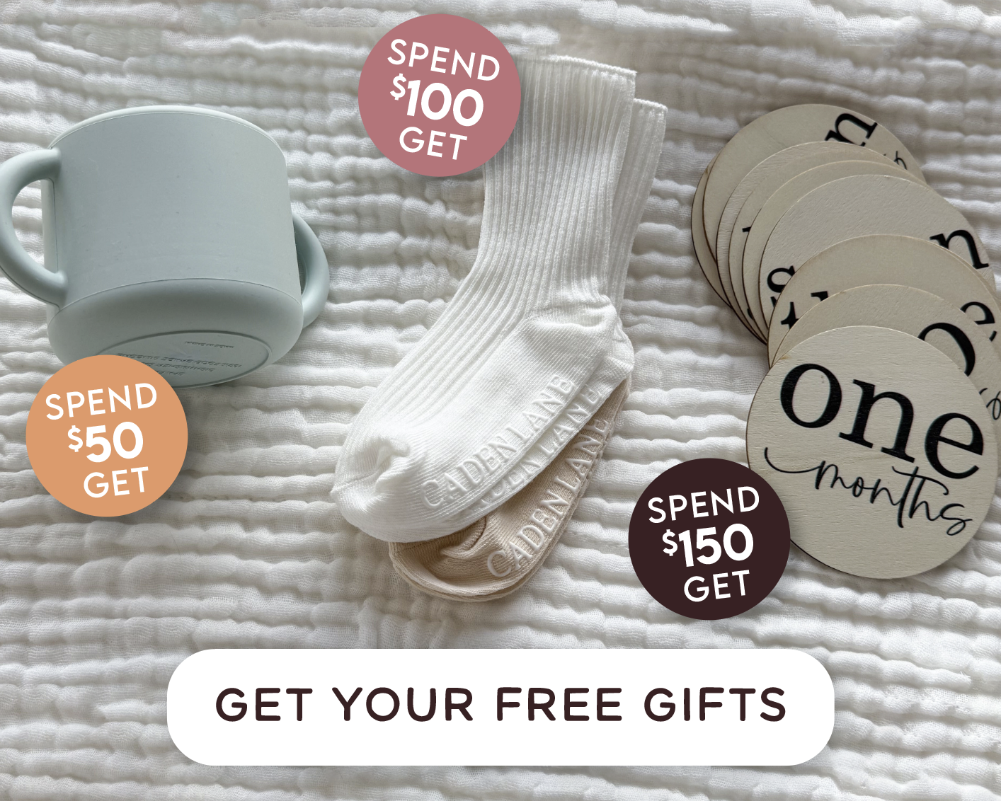 SPEND $50, GET A FREE SNACK CUP, SPEND $100 GET TWO PAIRS OF SOCKS! SPEND $150 GET A 12-PACK OF WOODEN MILESTONE SIGNS