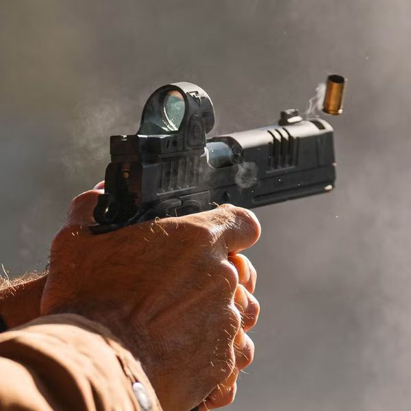 picture of a person shooting a pistol