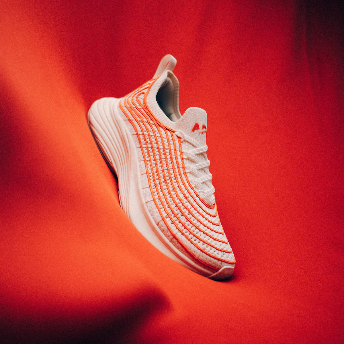 TechLoom Zipline in Ivory / Blood Orange