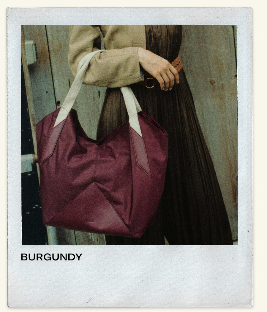 Woman holding Beverly Tote Burgundy