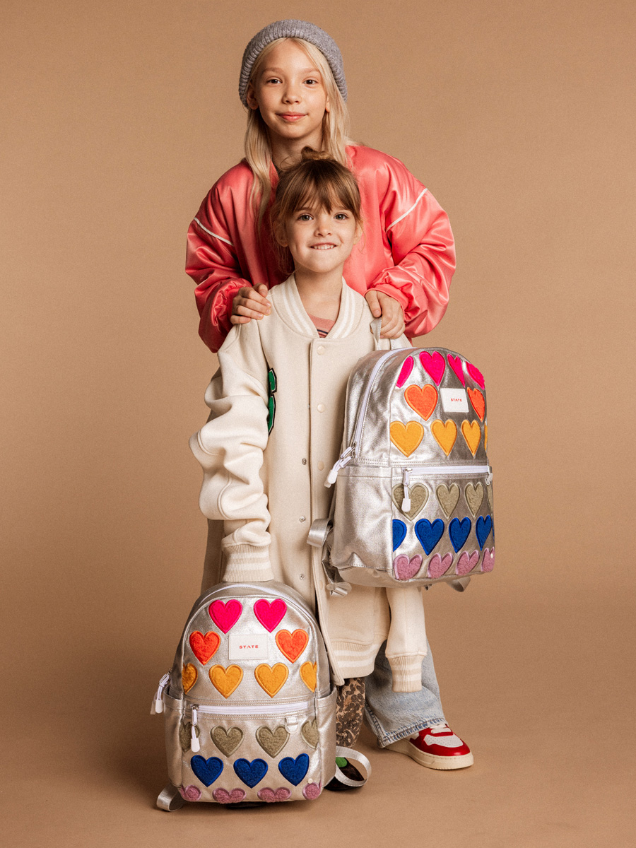 STATE Bags Backpacks in metallic fuzzy hearts