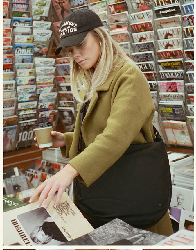 Girl wearing luna crossbody black