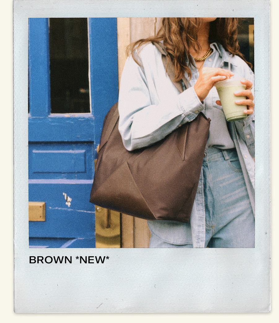 Woman wearing beverly tote brown