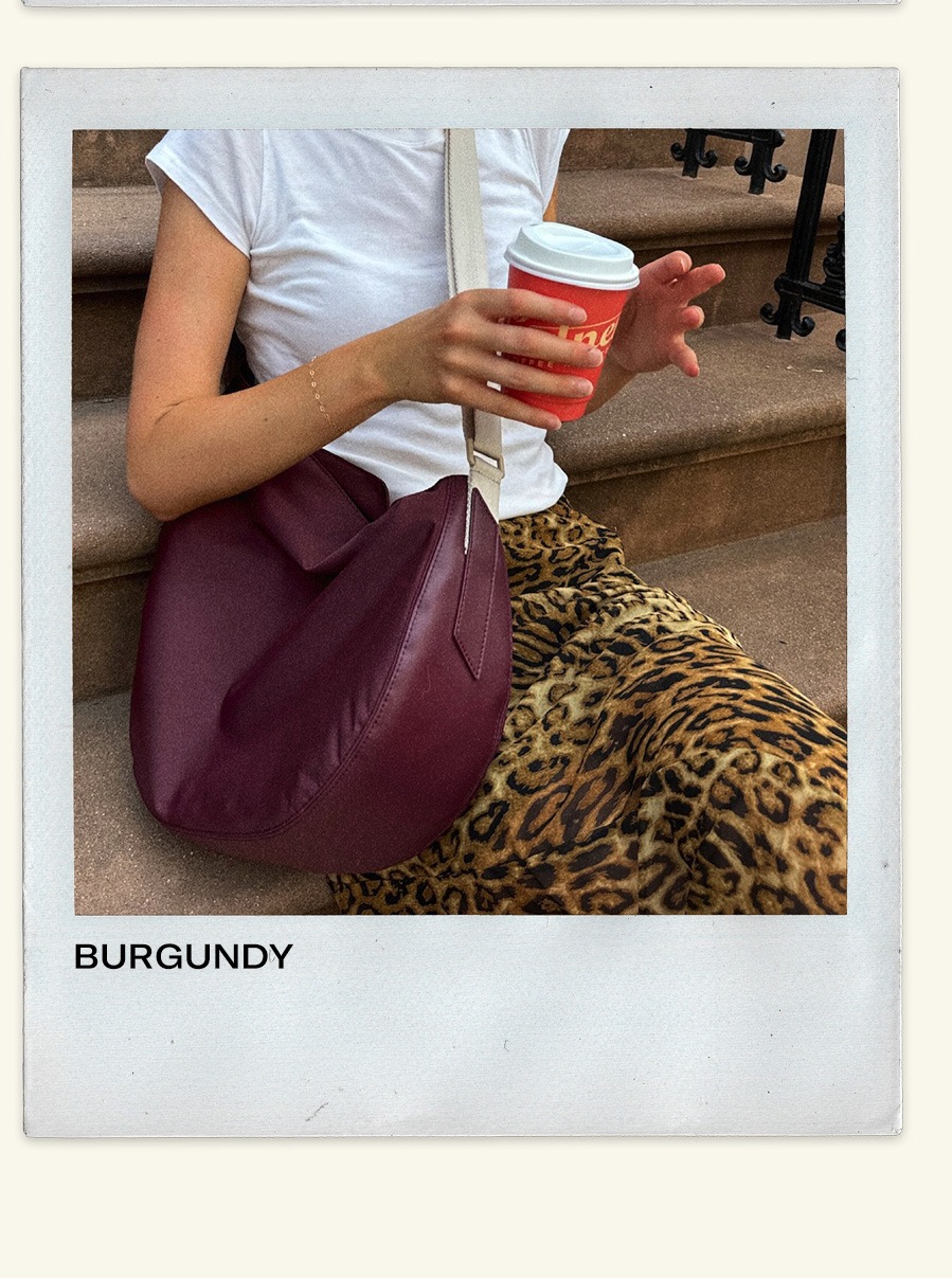 Woman wearing Luna Crossbody Burgundy