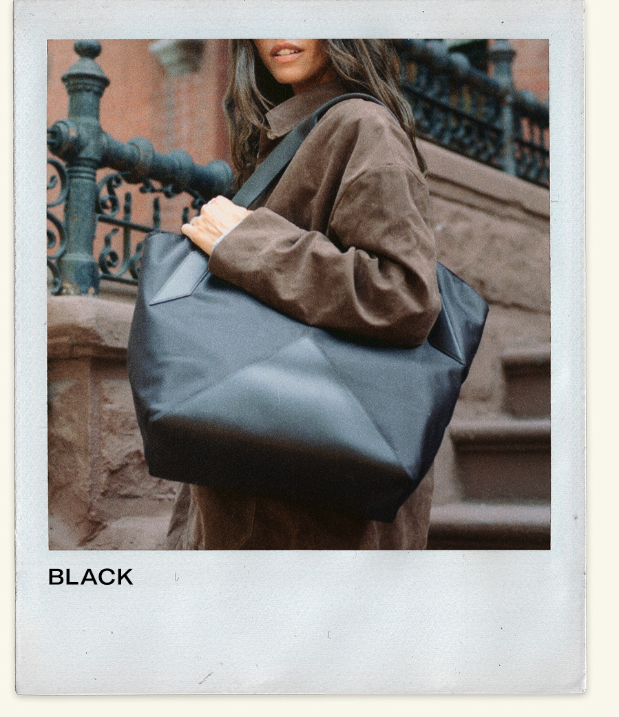 Woman wearing beverly tote black